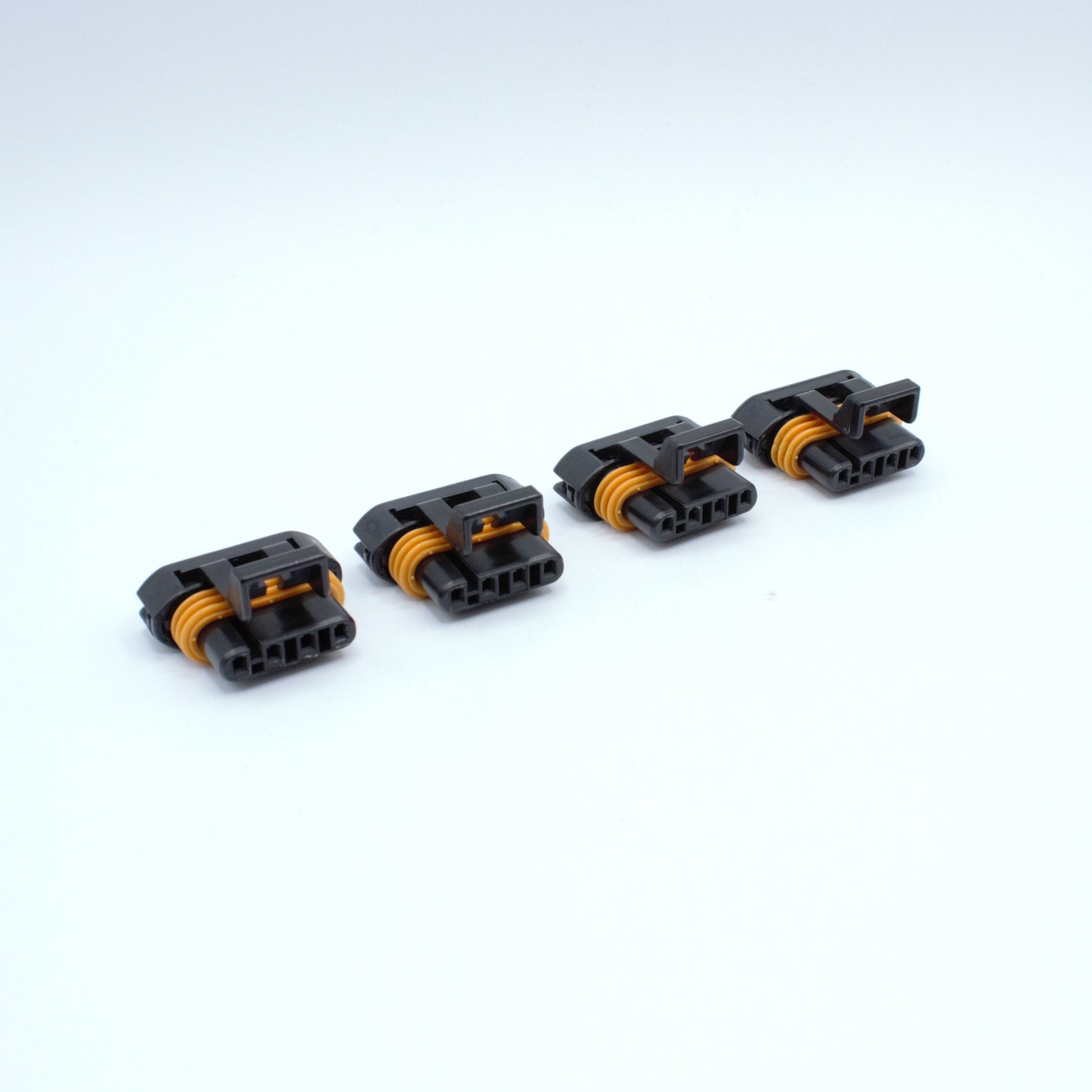 Set of 4 GM LS ignition coil connectors for Gen 3 IIV ignition coils or D585 truck LS2 ignition coils. 
Black with an orange seal, comes with a black TPA. Made by Delphi Metri-pack Metripack 150 series Code 1 coding keying 4 pin way terminal, sealed
Each set comes with terminals and seals
can be purchased as a set of 4, 6 or 8