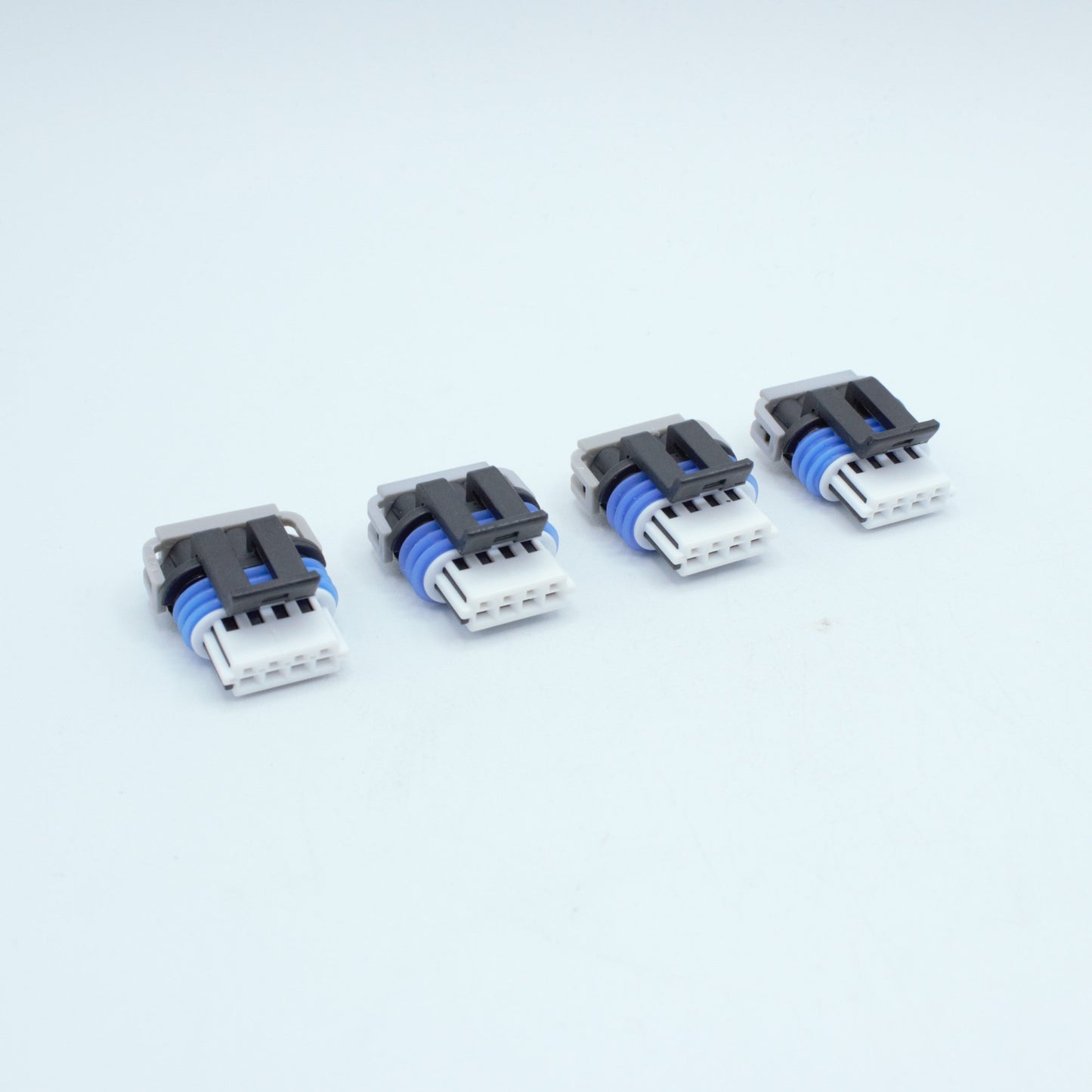 Set of 4 GM LS ignition coil connector for Gen 4 IV ignition coils or Corvette Camaro LS3 LS7 ignition coils. 
Black with an blue seal, comes with a white TPA on the front and a Grey . Made by Delphi GT150 series 4 pin way terminal, sealed
Each set comes with terminals and seals Code B coding keying
can be purchased as a set of 4, 6 or 8PS on the pack