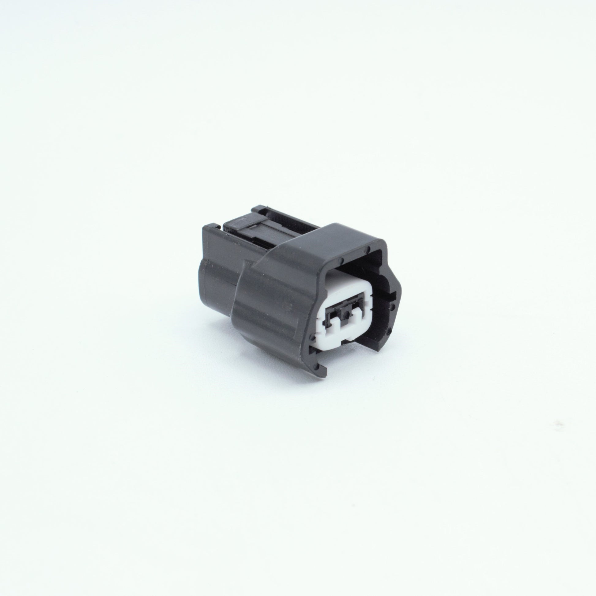 Nissan injector connector for RB and SR engines
Black with a white TPA 
left side low key right side high key
comes with terminals and seals
Made by Sumiomo RS type E series 2  pin way terminal, sealed
sold as a set of 4 or 6