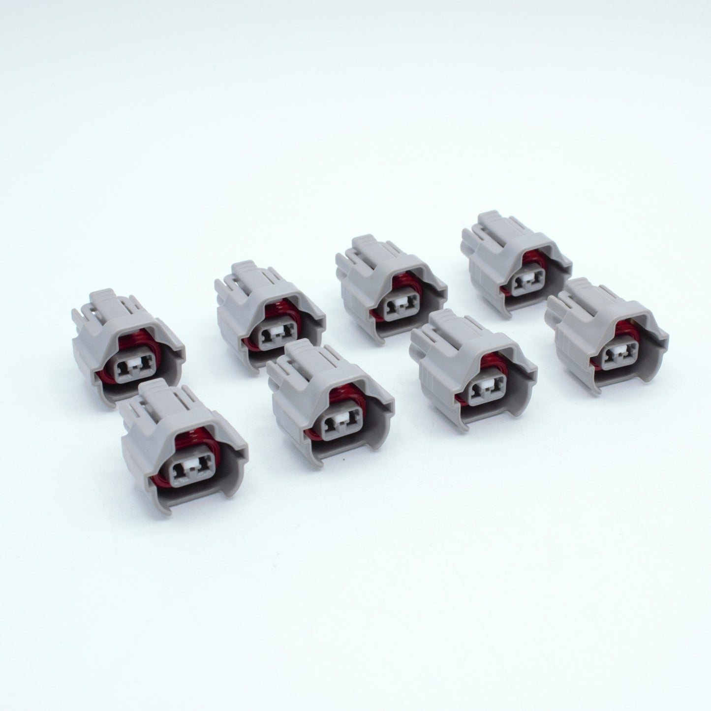Set of 8 Toyota EV6 USCAR injector connector
Grey with a red seal orange seal and a white TPA
Has 2 keys that are high higher close to top
2 terminal, sealed
Made by Sumitomo TS series
sold in sets of 4, 6 or 8 
For 1JZ 2JZ 1UZ 3UZ engines