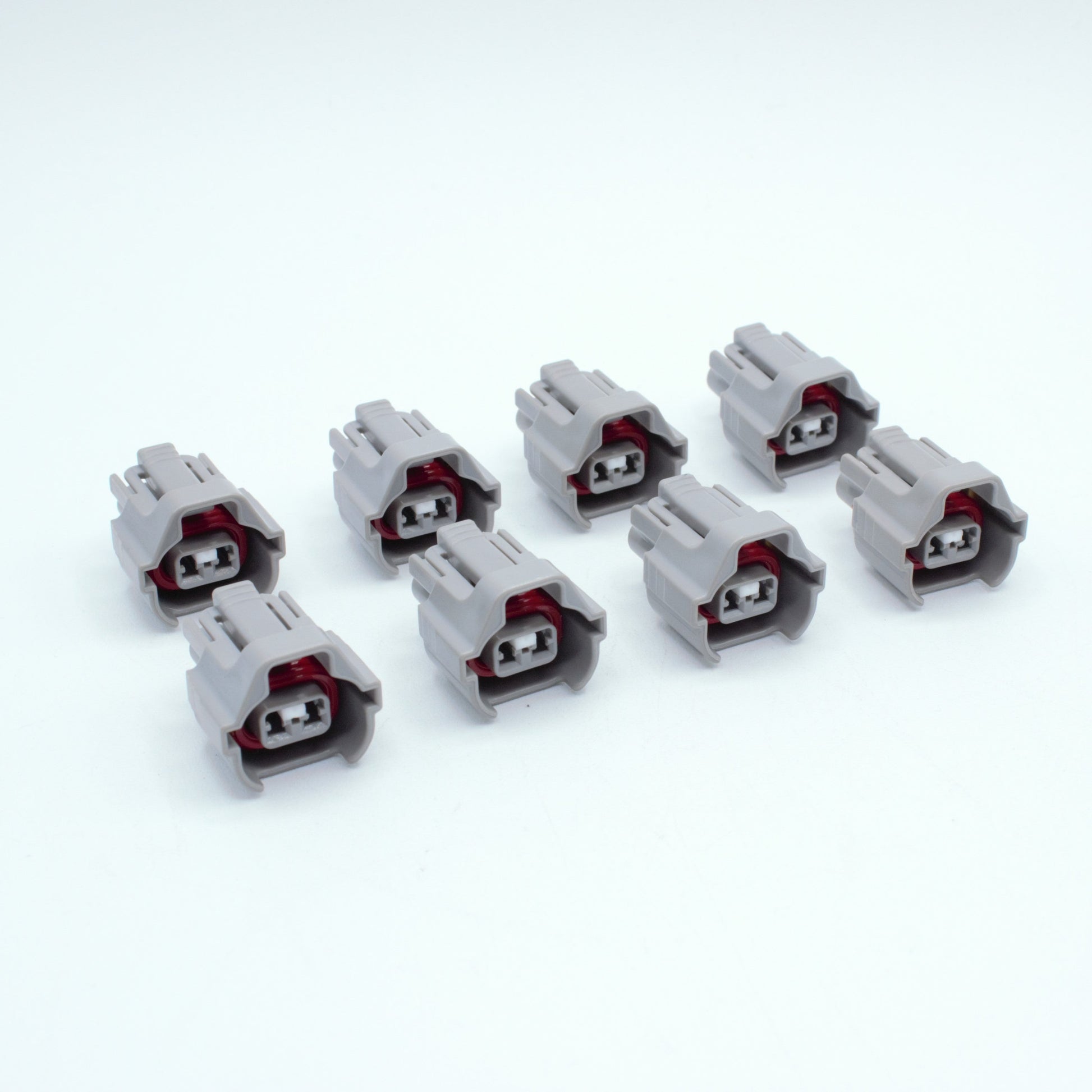 Set of 8 Toyota EV6 USCAR injector connector
Grey with a red seal orange seal and a white TPA
Has 2 keys that are high higher close to top
2 terminal, sealed
Made by Sumitomo TS series
sold in sets of 4, 6 or 8 
For 1JZ 2JZ 1UZ 3UZ engines