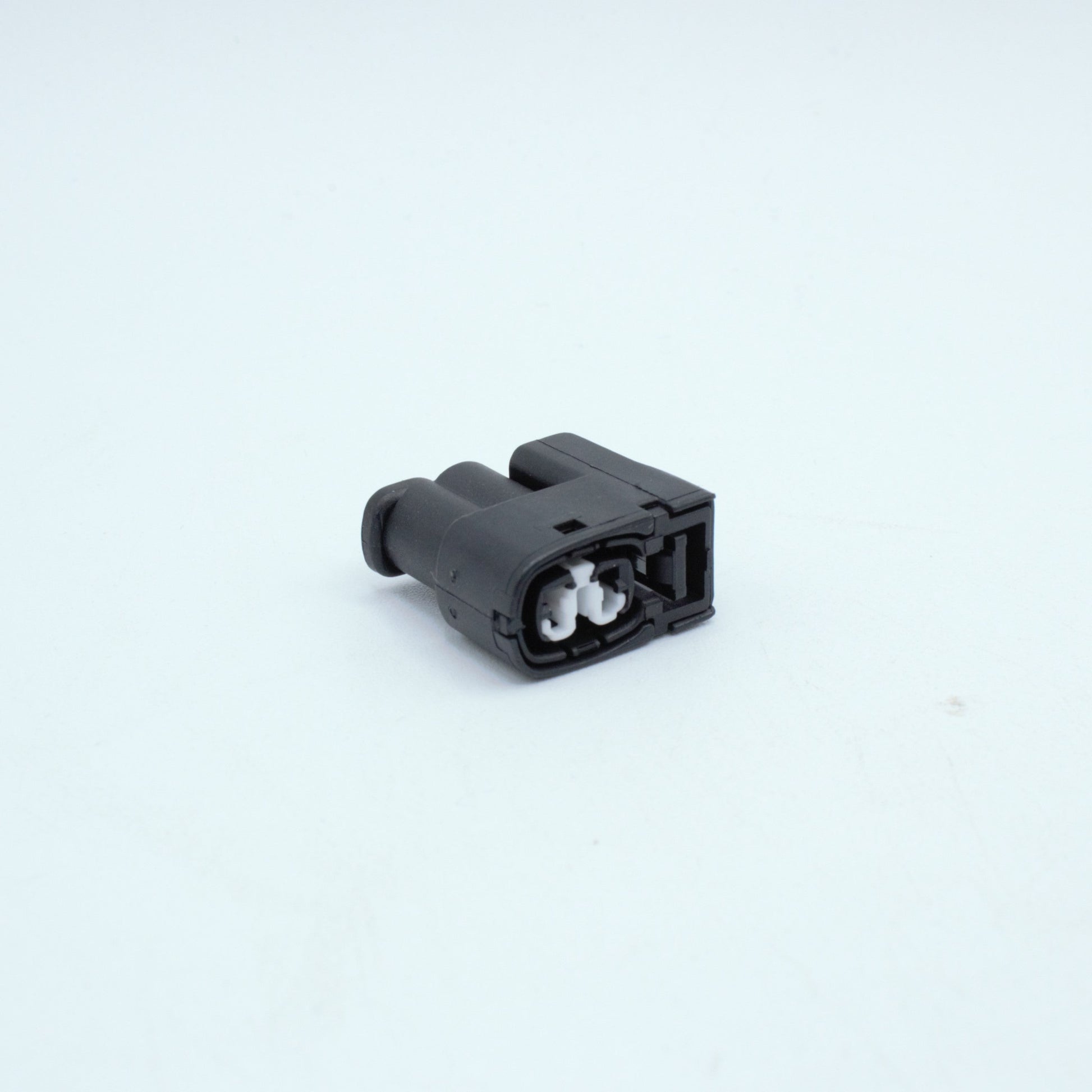 Toyota ignition coil connector
2 pin way terminal, sealed
Black with white TPA in center
Made by Yazaki Sumitomo 090 090II series

commonly used in UZ ignition systems with distributors and 1JZ 2JZ coils as well as 7M and other Toyota engines

sold as a set of 2, 3 or 6, comes with terminals and seals
