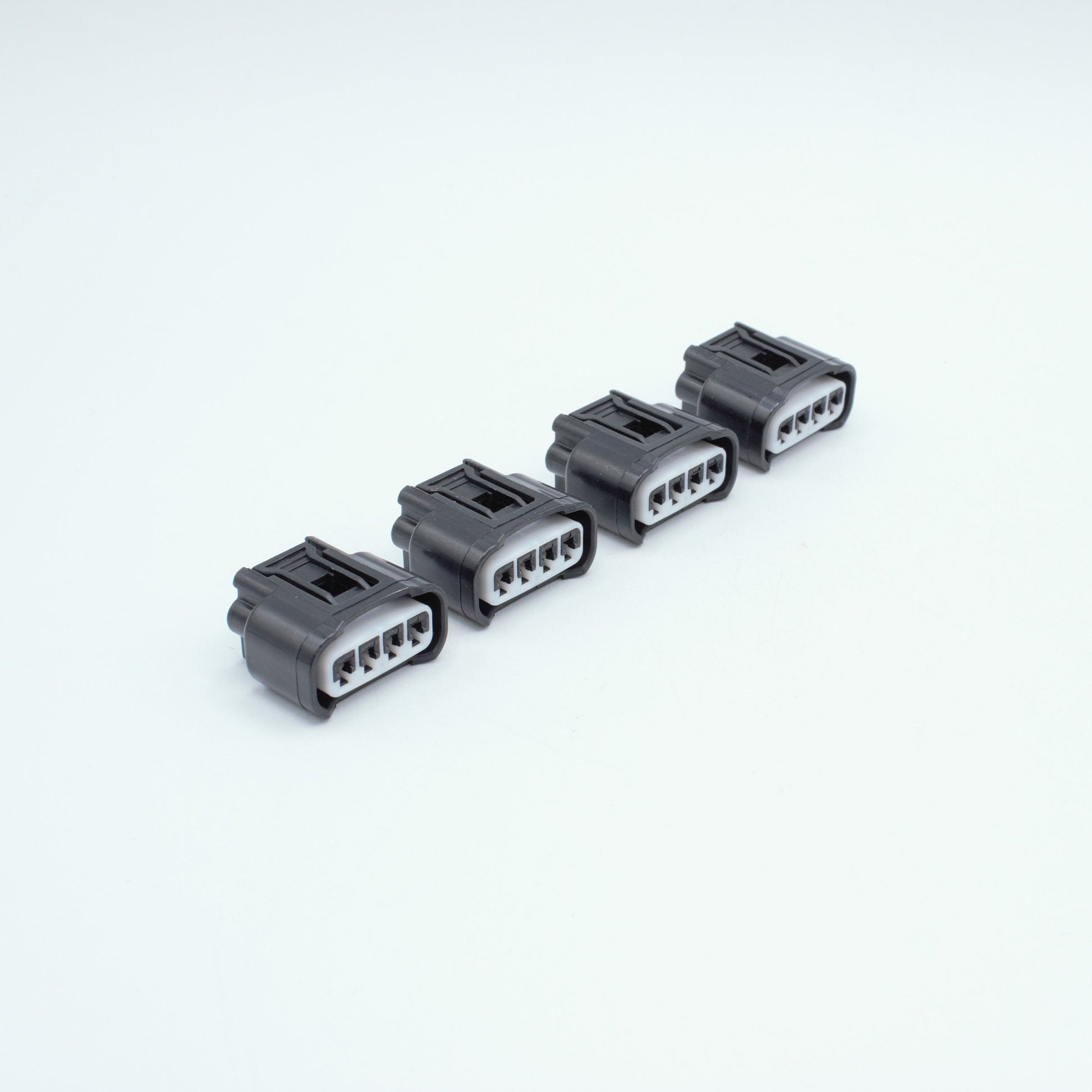 Set of 4 Toyota 3UZ 1ZZ ignition coil connectors
black with white TPA
Sealed
4 way terminal pin
Made by Yazaki 090 090 II series

Common upgrade for SR20 ignition systems, JZ and RB
sold as a set of 4 with terminals and seals